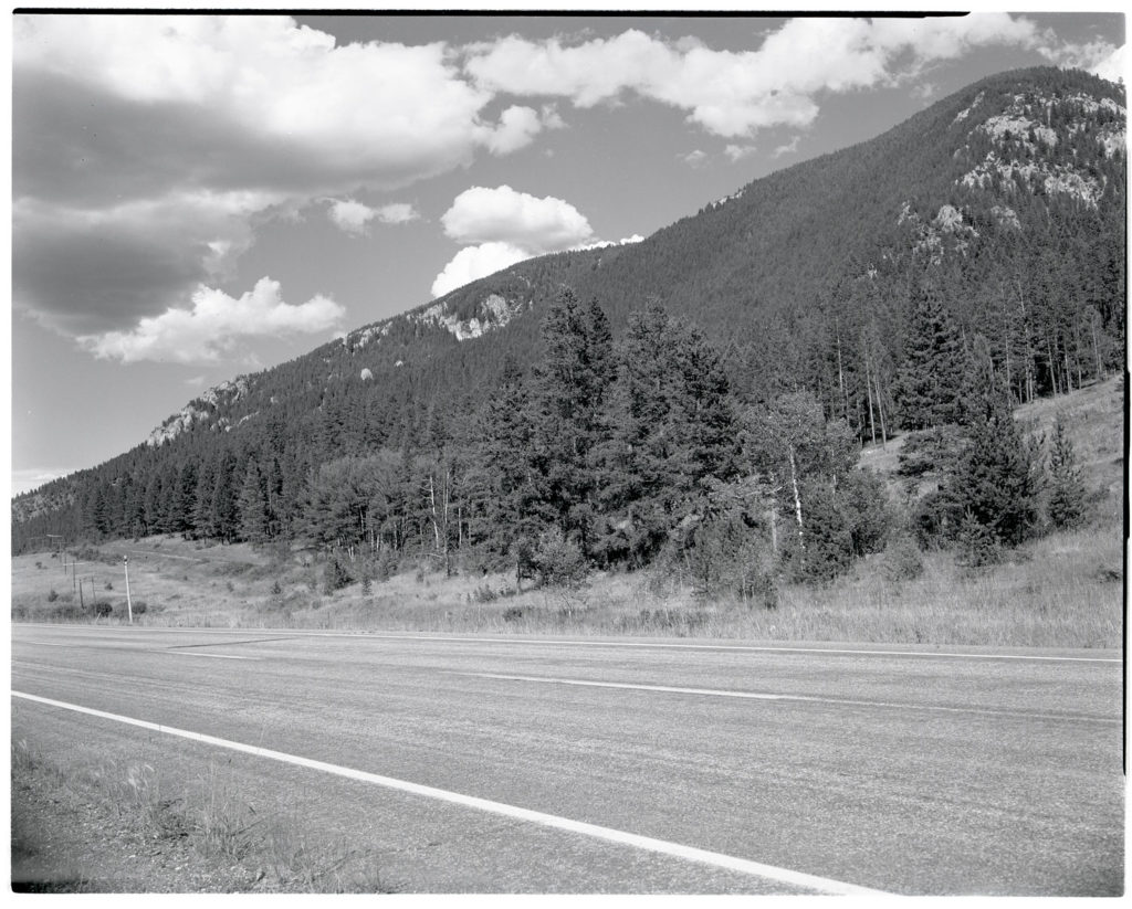 A view from the same hillside, now located just off the highway. Date: 07/21/1981 Credit: George Gruell (USFS) Archived at the Mansfield Library at the University of Montana